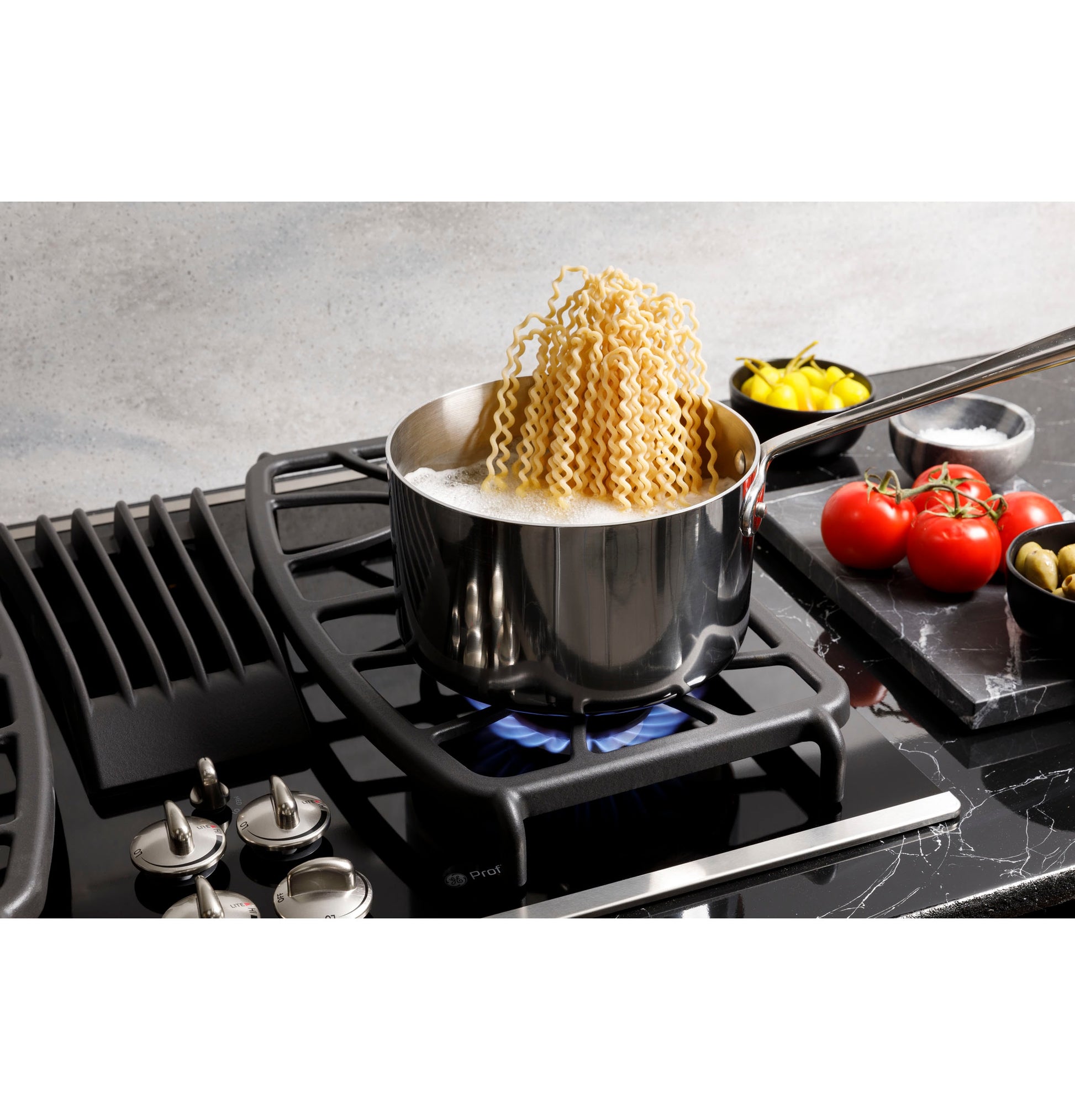 GE Profile 30-in 4 burners Stainless Steel Gas Cooktop with Downdraft Exhaust