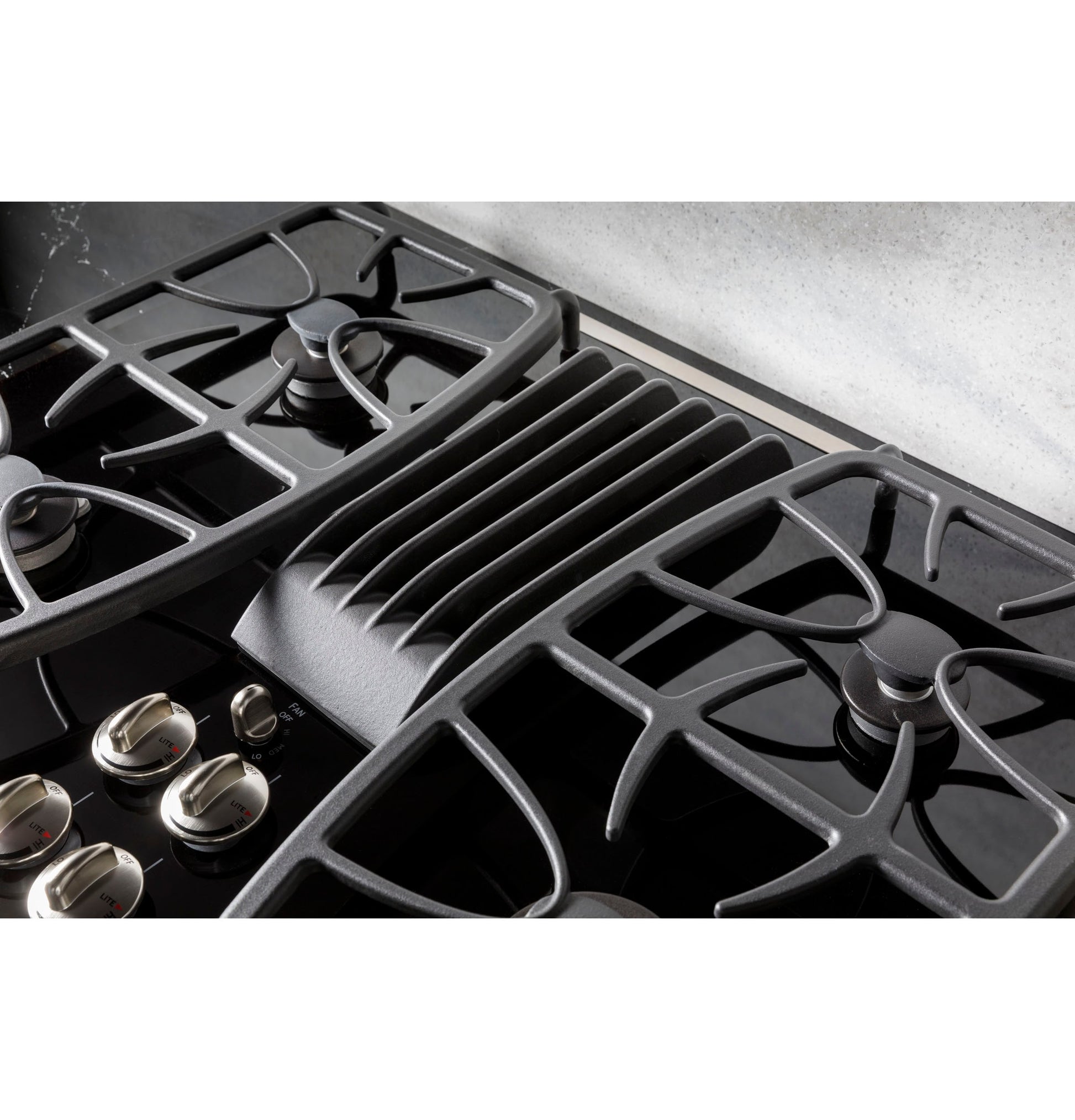 GE Profile 30-in 4 burners Stainless Steel Gas Cooktop with Downdraft Exhaust
