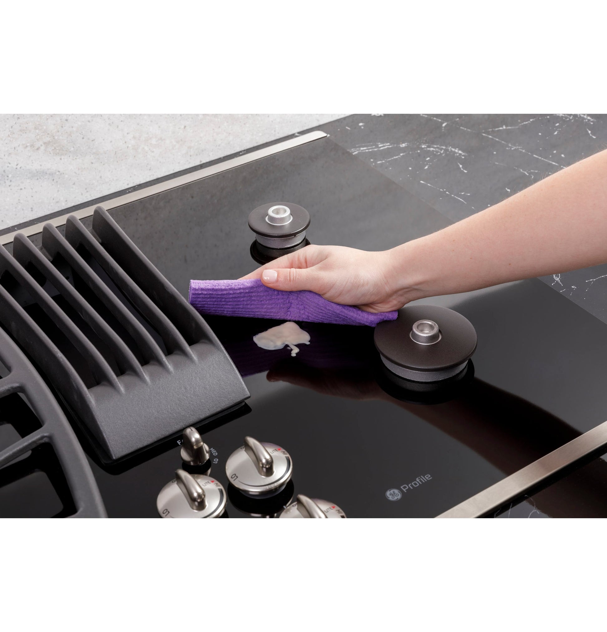 GE Profile 30-in 4 burners Stainless Steel Gas Cooktop with Downdraft Exhaust