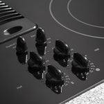 GE Profile 30-in 4 burners Smooth surface Black Electric Cooktop with Downdraft Exhaust with Bridge Element