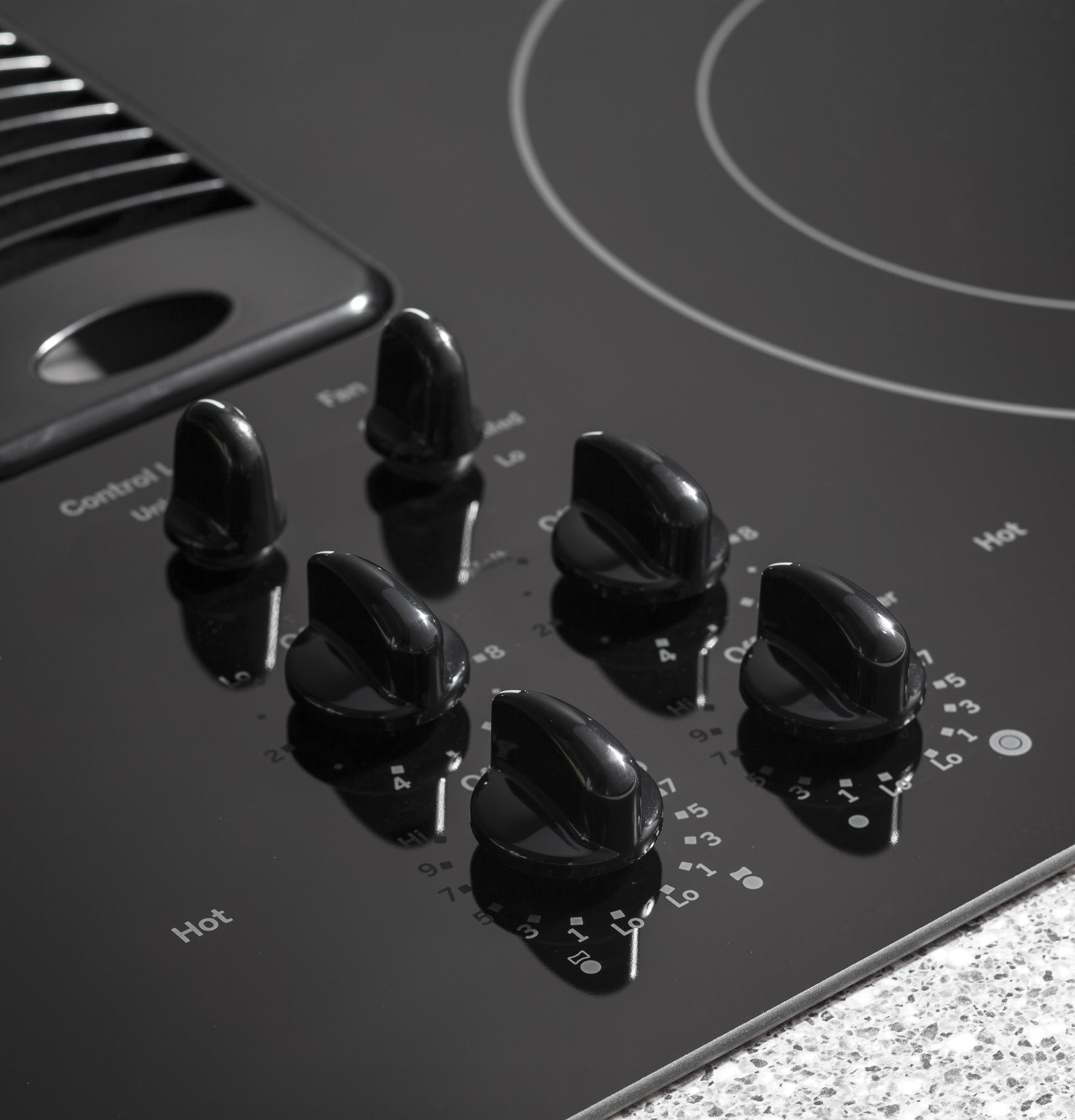 GE Profile 30-in 4 burners Smooth surface Black Electric Cooktop with Downdraft Exhaust with Bridge Element