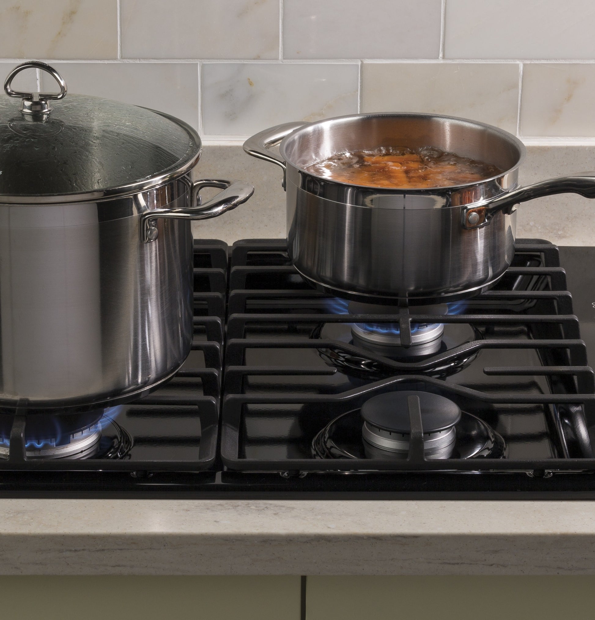 GE 30-in 4 burners Black Gas Cooktop