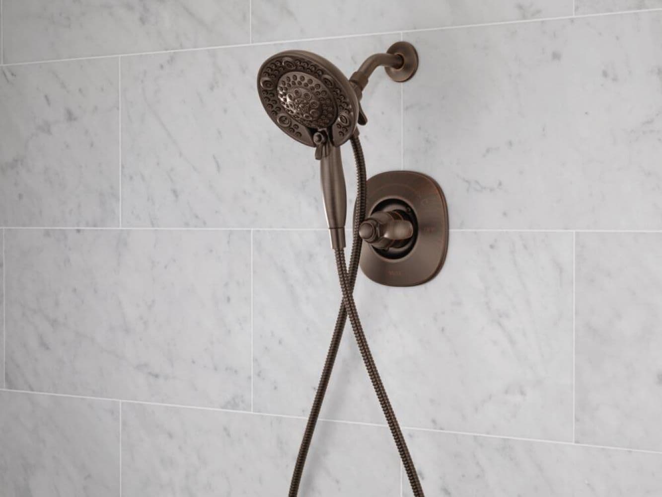 Delta Nura Venetian Bronze 1-handle 6.5-in Round Shower Faucet with Valve (Multi-function)
