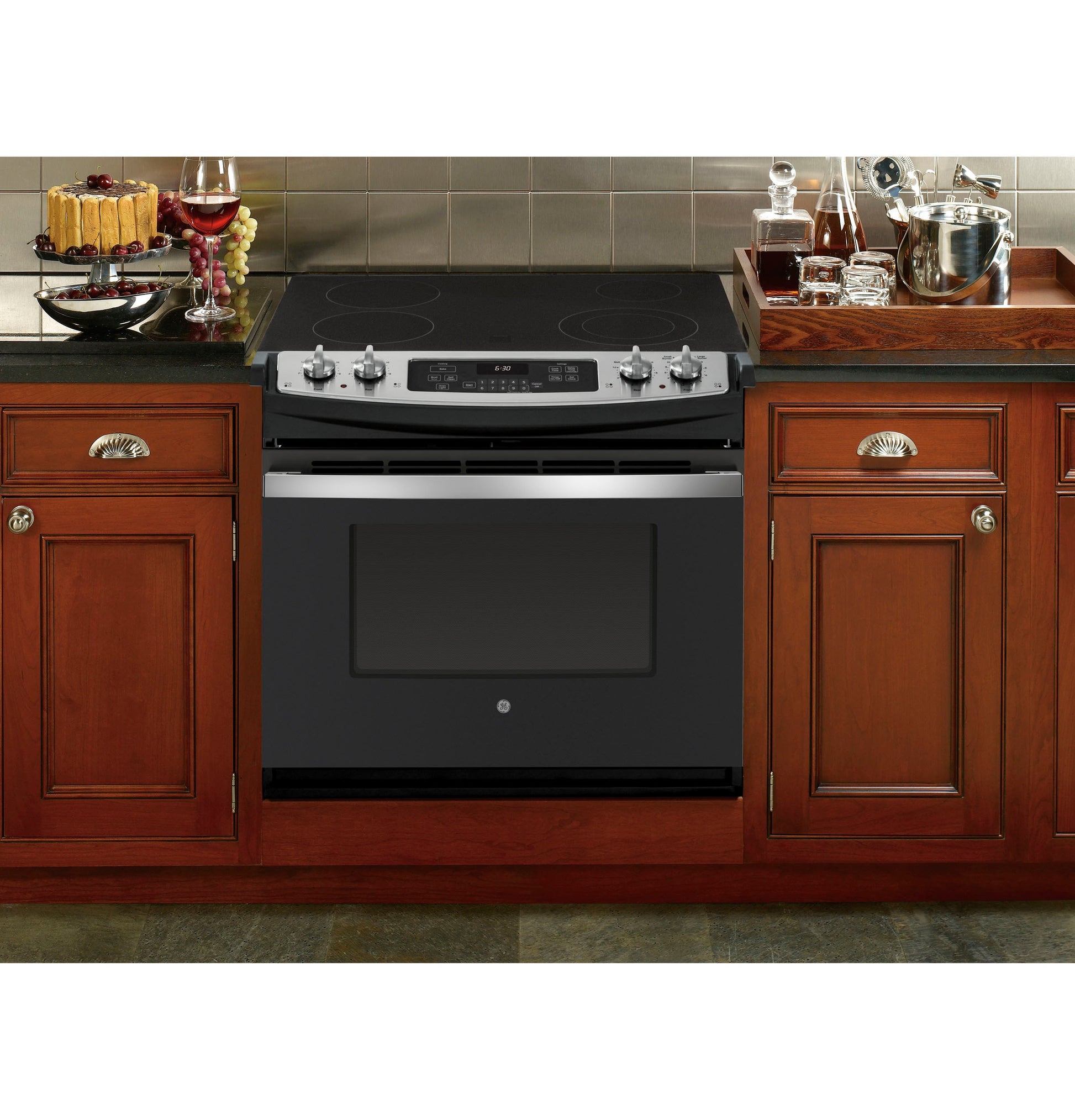 GE 30-in Glass Top 4 burners 4.4-cu ft Drop-In Electric Range ( Black ), JD630ST3SS, FINAL PRICE: $1,299.99