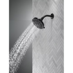 Delta Universal Showering Components 5.0 -Spray Matte Black 6-in Round High Pressure Shower Head 1.75 G.  PM