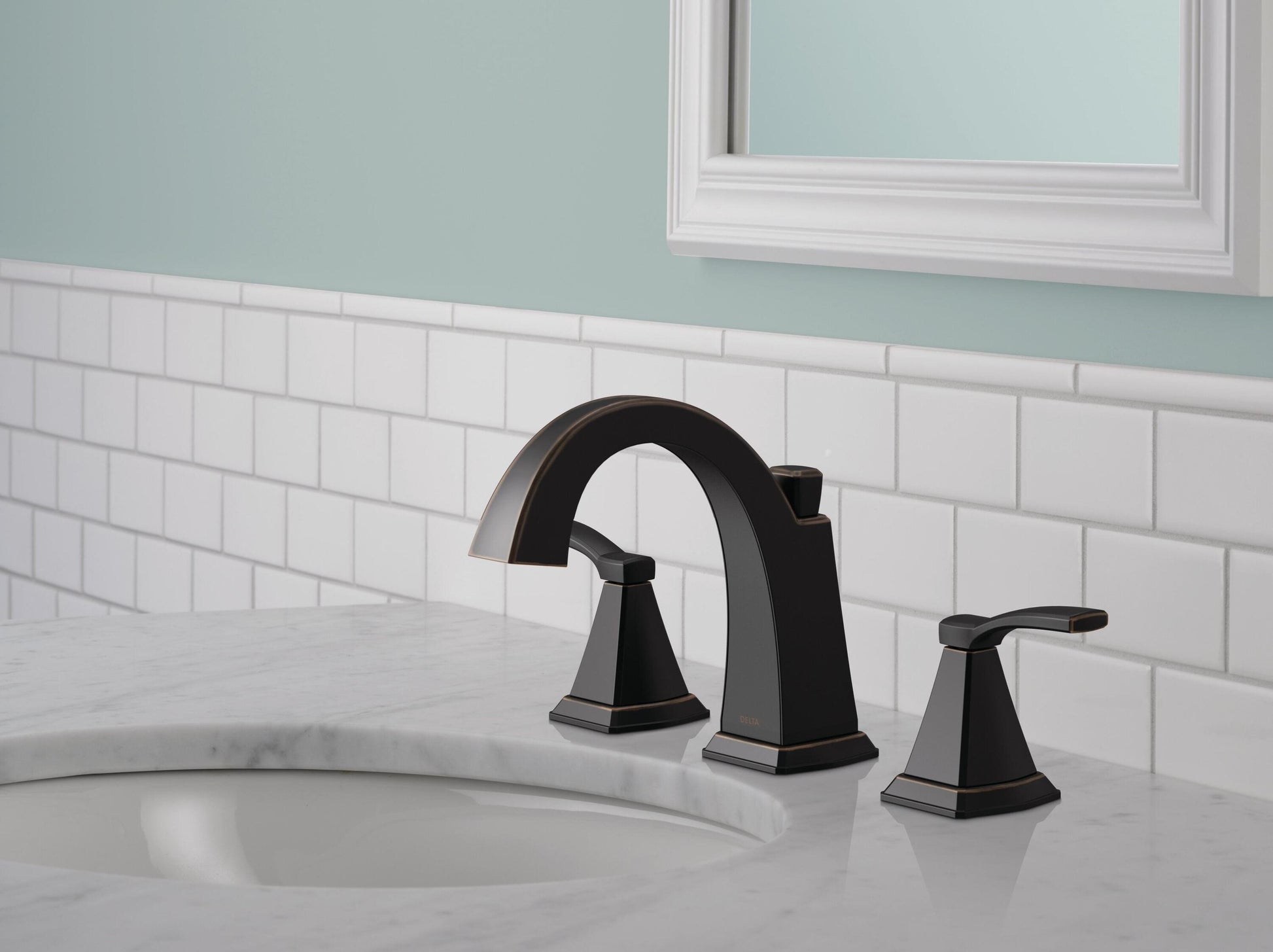Delta Flynn Oil Rubbed Bronze Widespread 2-handle WaterSense Mid-arc Residential Handle Bathroom Sink Faucet with Drain