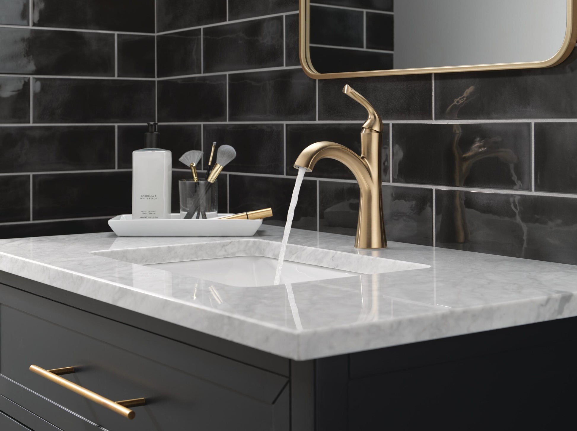 Delta Eldren Gold Champagne Bronze Single hole 1-handle WaterSense Mid-arc Residential Handle Bathroom Sink Faucet with Drain with Deck Plate