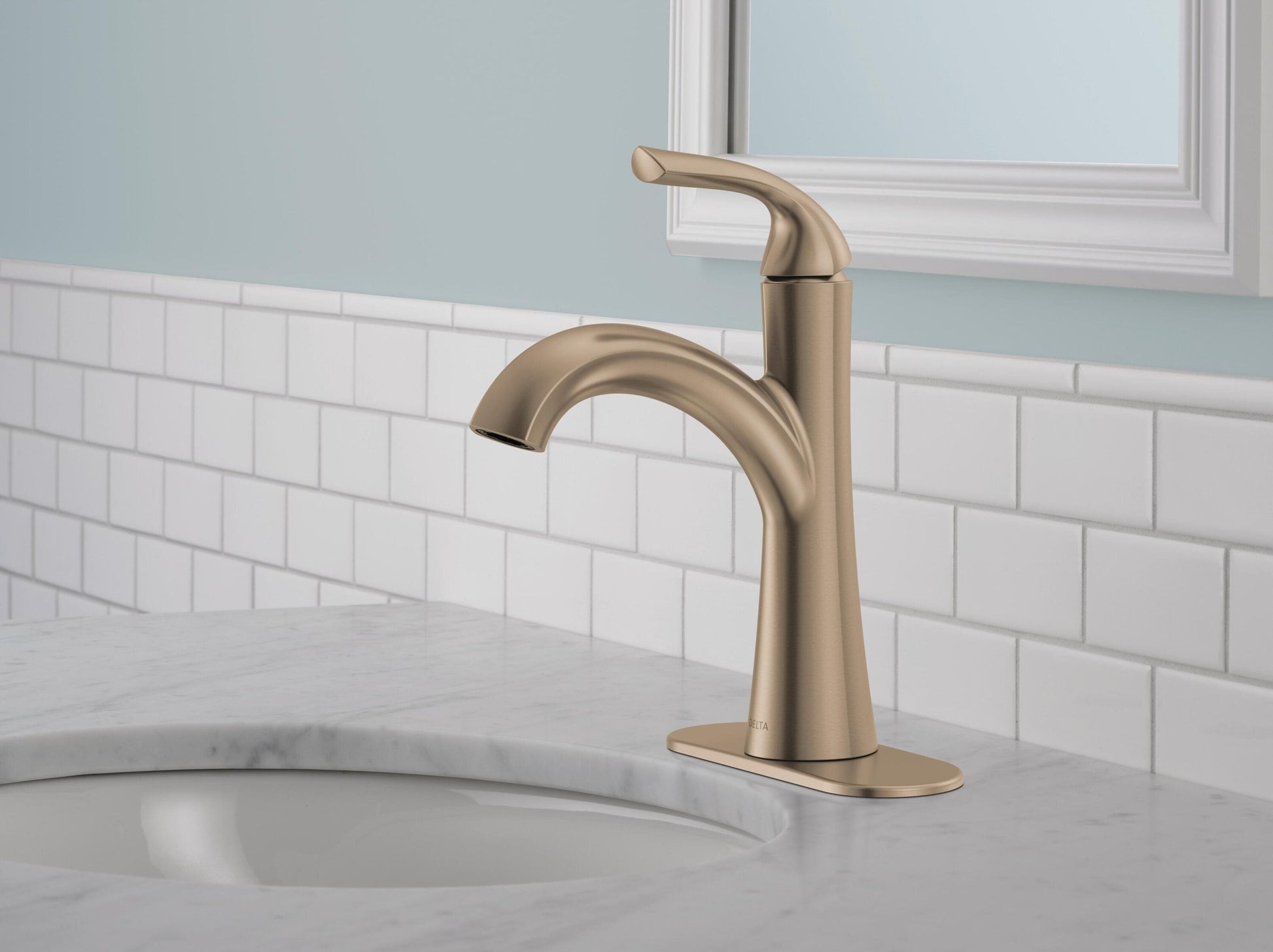 Delta Eldren Gold Champagne Bronze Single hole 1-handle WaterSense Mid-arc Residential Handle Bathroom Sink Faucet with Drain with Deck Plate