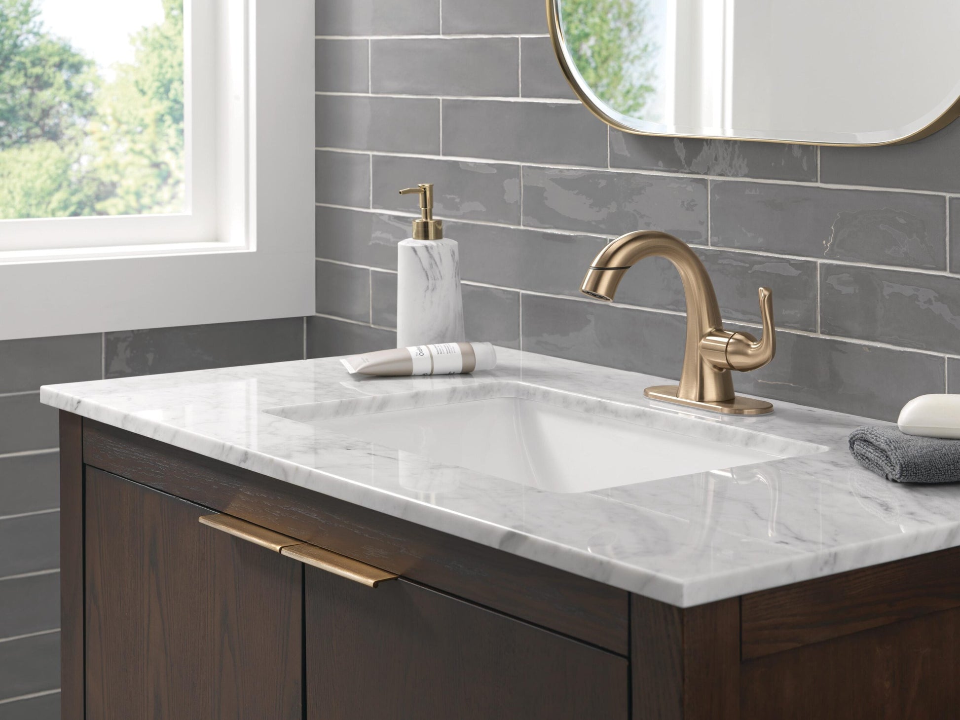 Delta Arvo Champagne Bronze Single hole 1-handle WaterSense Mid-arc Residential Handle