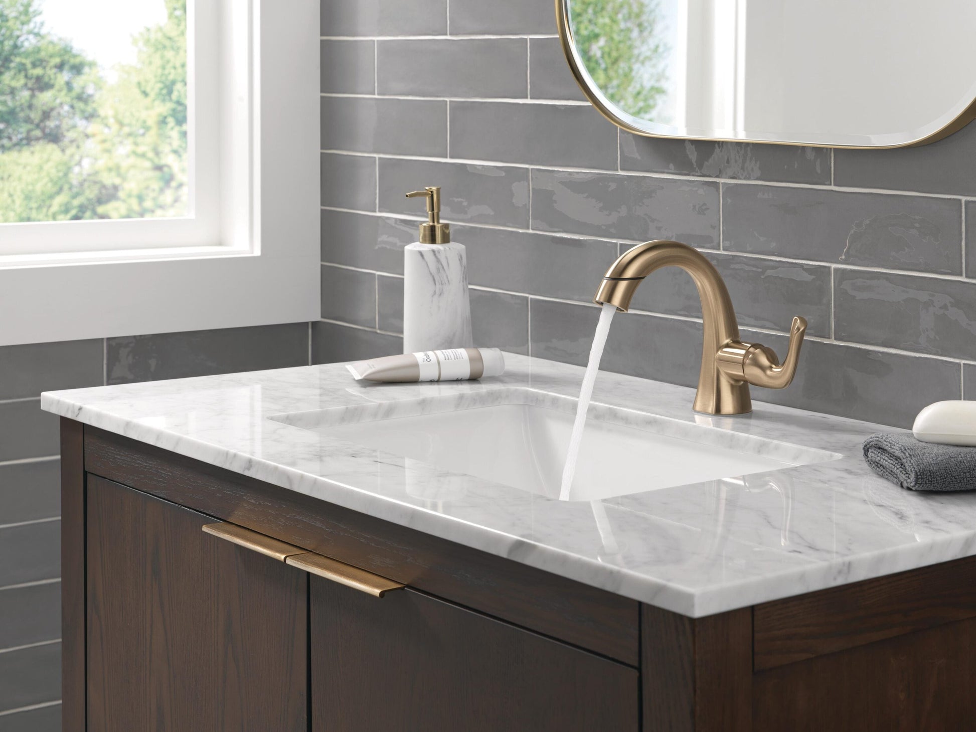 Delta Arvo Champagne Bronze Single hole 1-handle WaterSense Mid-arc Residential Handle