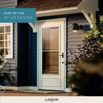 LARSON 40 Midview 36-in x 81-in Almond Wood core Reversible Hinge Storm Door with Retractable Screen