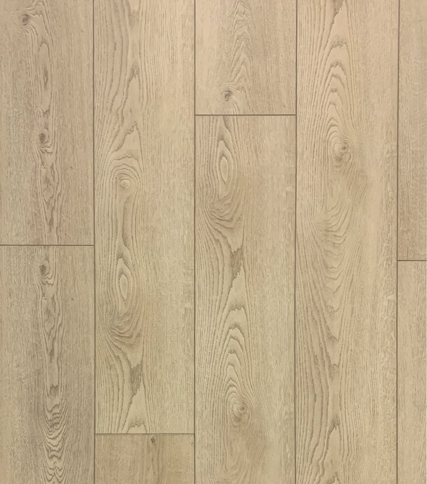 A close-up image of luxury vinyl plank flooring with a wood grain appearance.