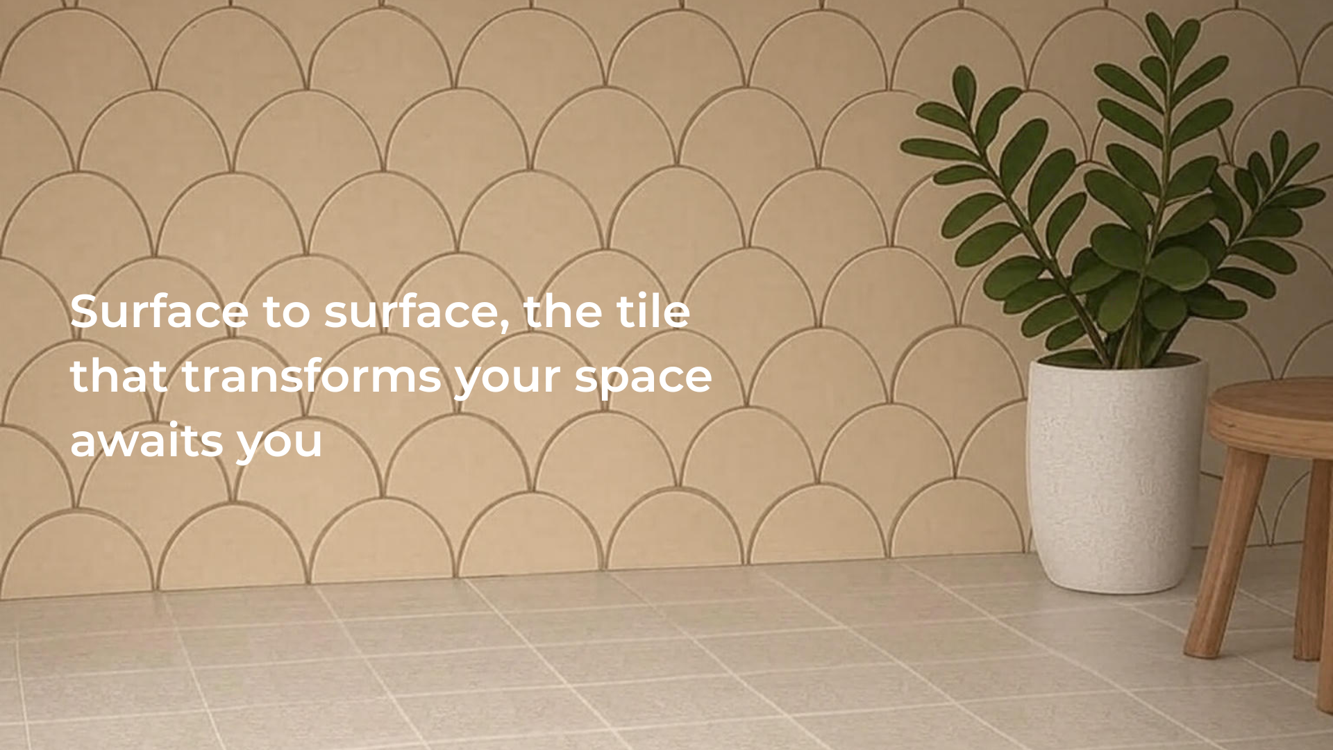 Beige tiled wall with decorative pattern and a plant on a stool