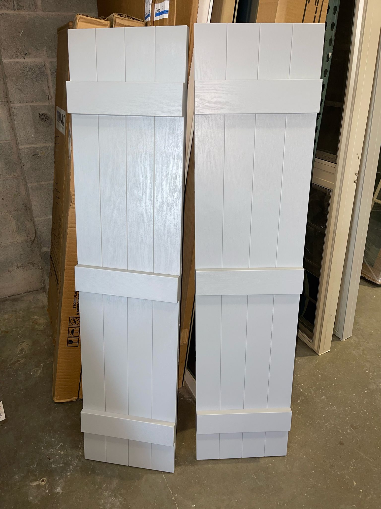 TRIBUILT 14 in. W x 59 in. H Vinyl Exterior Joined Board and Batten Shutters Pair in White