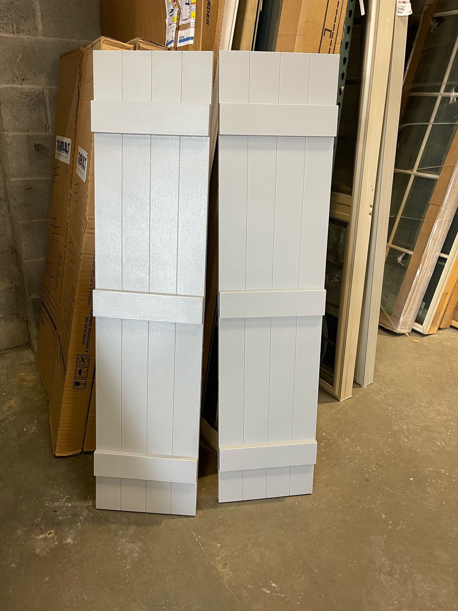 TRIBUILT 14 in. W x 59 in. H Vinyl Exterior Joined Board and Batten Shutters Pair in White