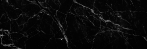Black marble texture with white veins on a black background