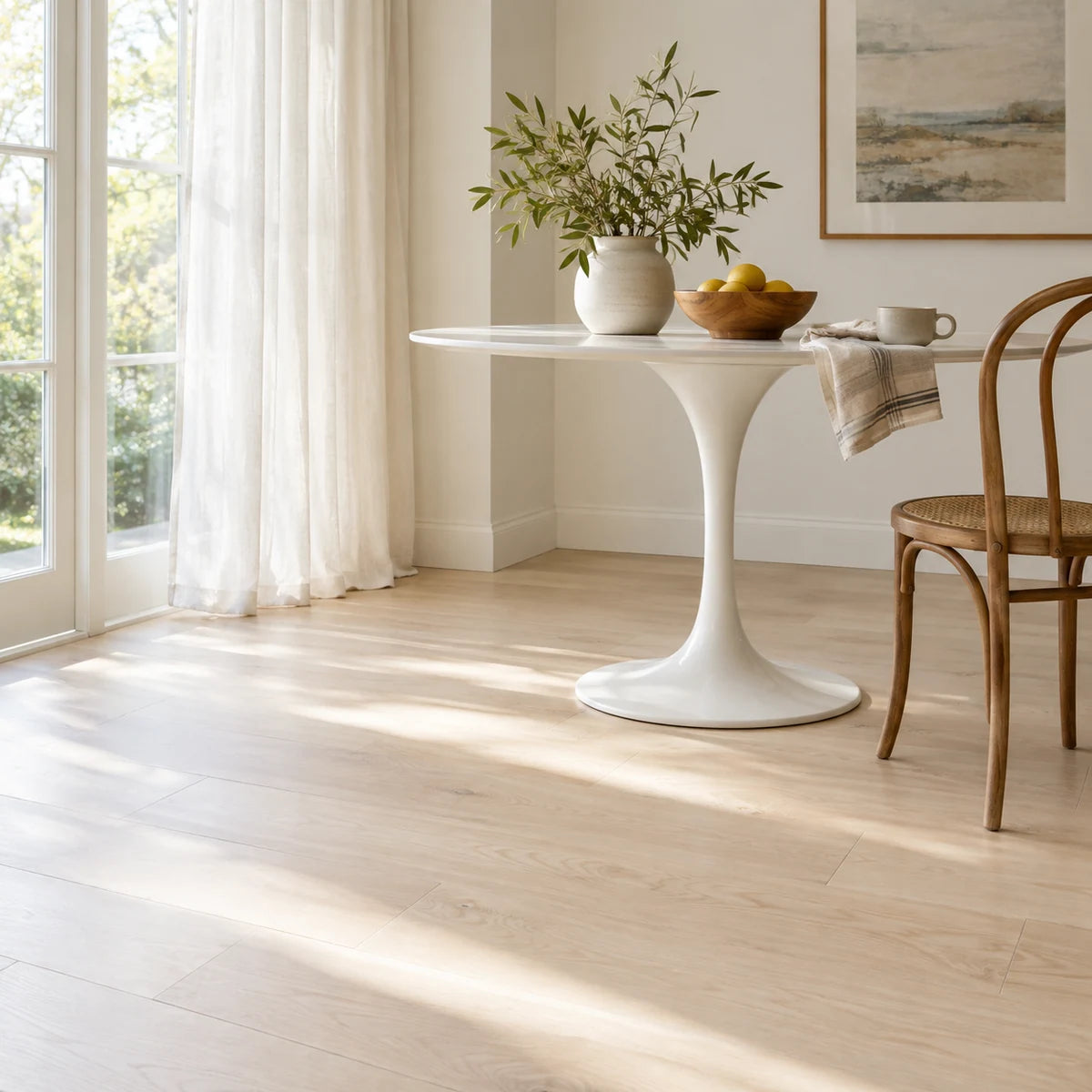 Pale maple flooring in a bright breakfast nook.